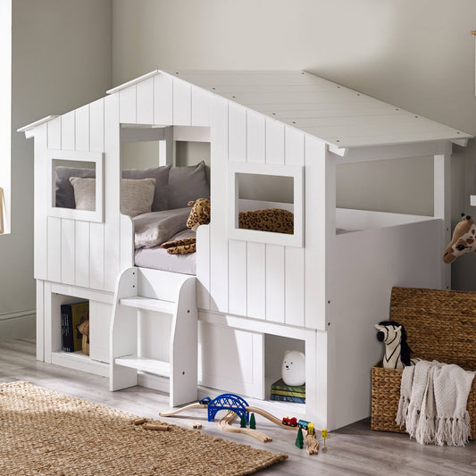 Acorn Treehouse Mid Sleeper Bed & Storage Unit in white, styled in a child’s bedroom