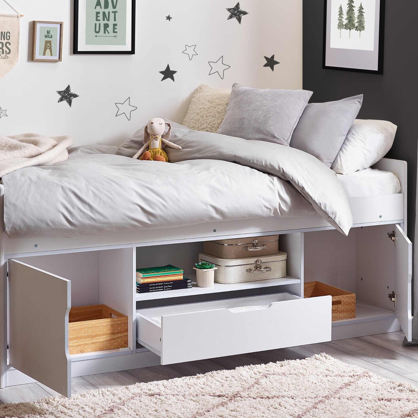 Atom Cabin Bed in white with open storage in a child's bedroom setting