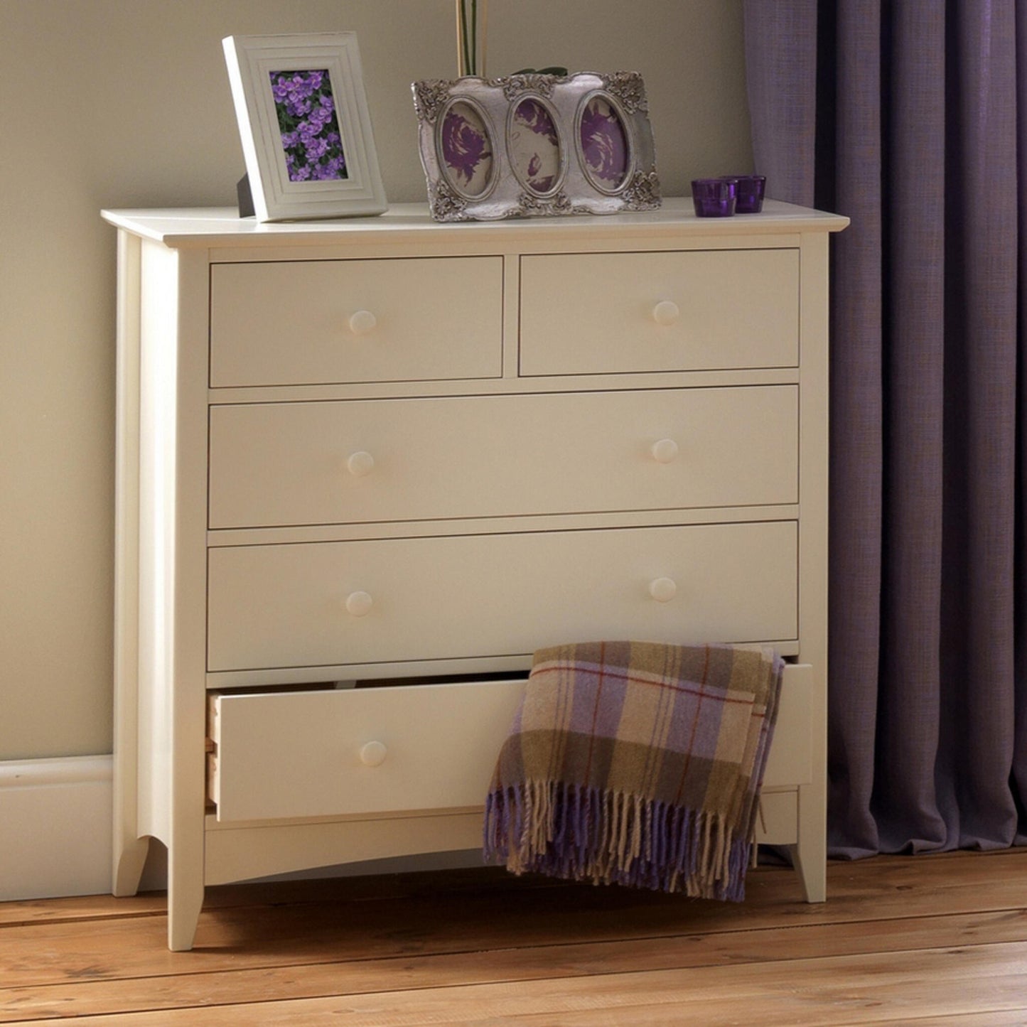 Cameo 3 + 2 Drawer Chest in Stone White shown in a bedroom setting.