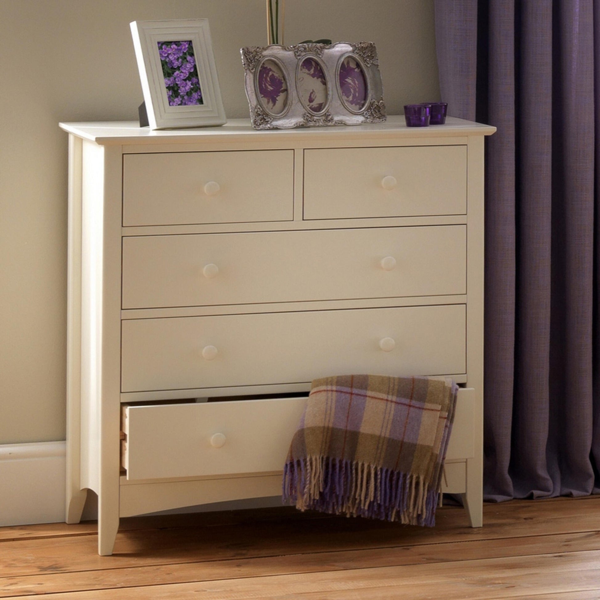 Cameo 3 + 2 Drawer Chest in Stone White shown in a bedroom setting.