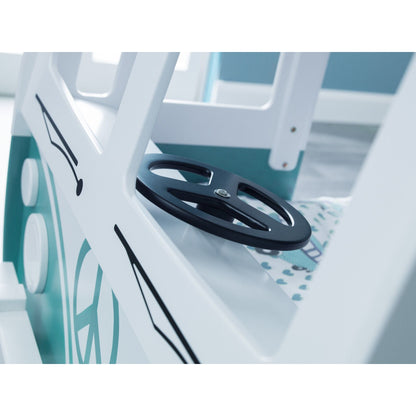 Steering wheel detail of Campervan Bunk Bed viewed through front window