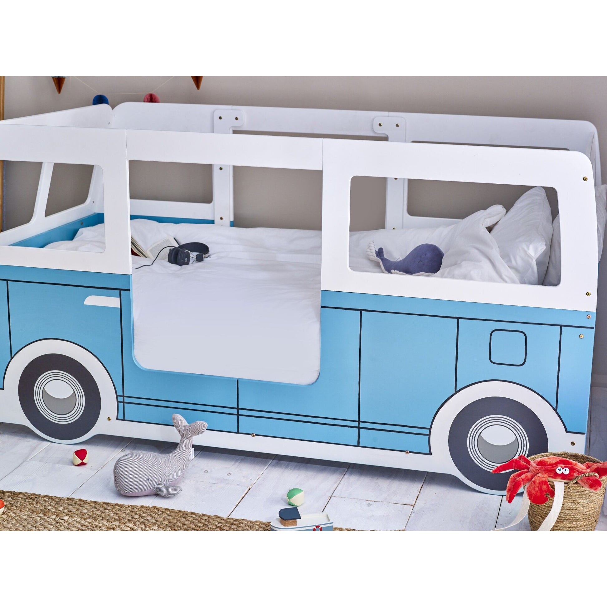 Side profile of a children's campervan bed in blue and white