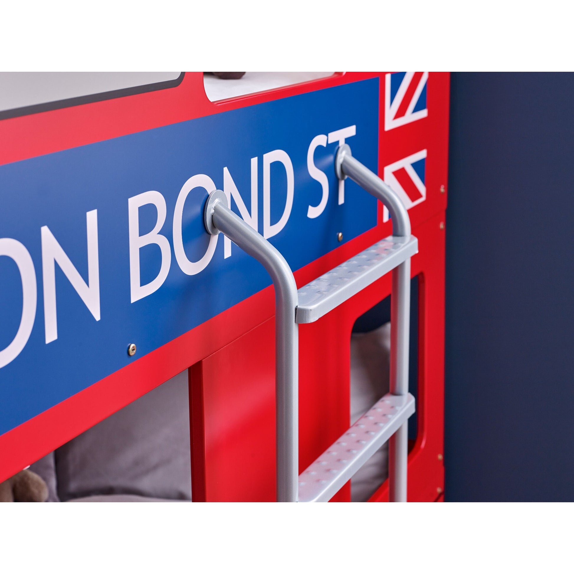 Top rungs of metal ladder secured to children’s London Bus Bunk Bed 