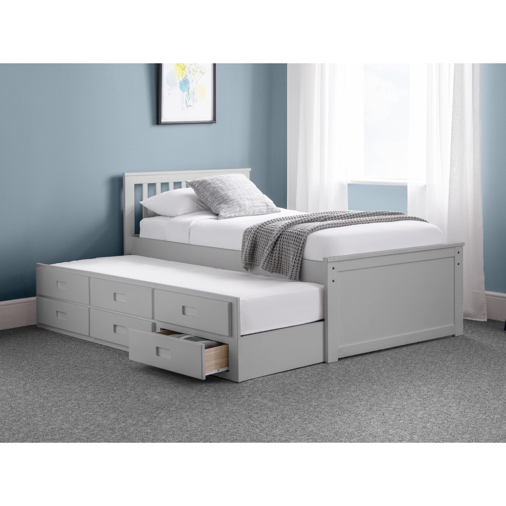 Wide bedroom view of Maisie Trundle Bed with Drawers in dove grey with underbed extended