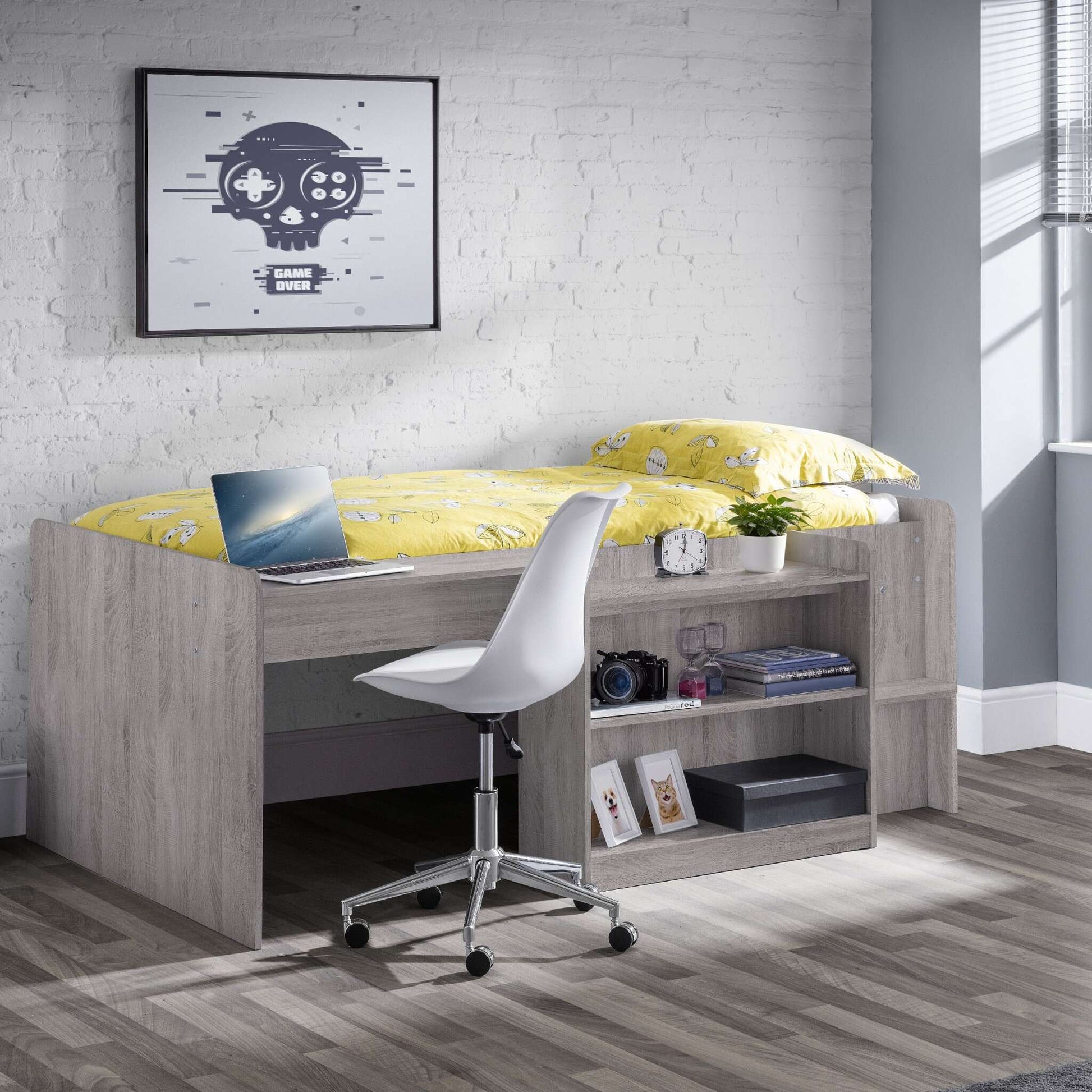 Neptune Mid Sleeper Cabin Bed in grey oak shown in a bedroom setting