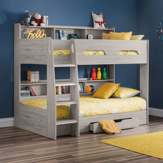 Orion Bunk Bed in grey oak with shelving and storage drawer styled in a child's bedroom