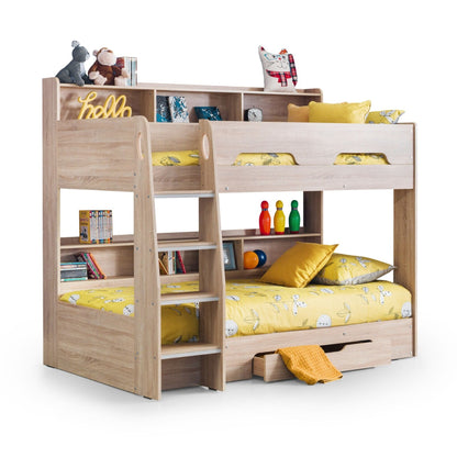 Styled angled view of this sonoma oak bunk bed with mattresses and open storage drawer