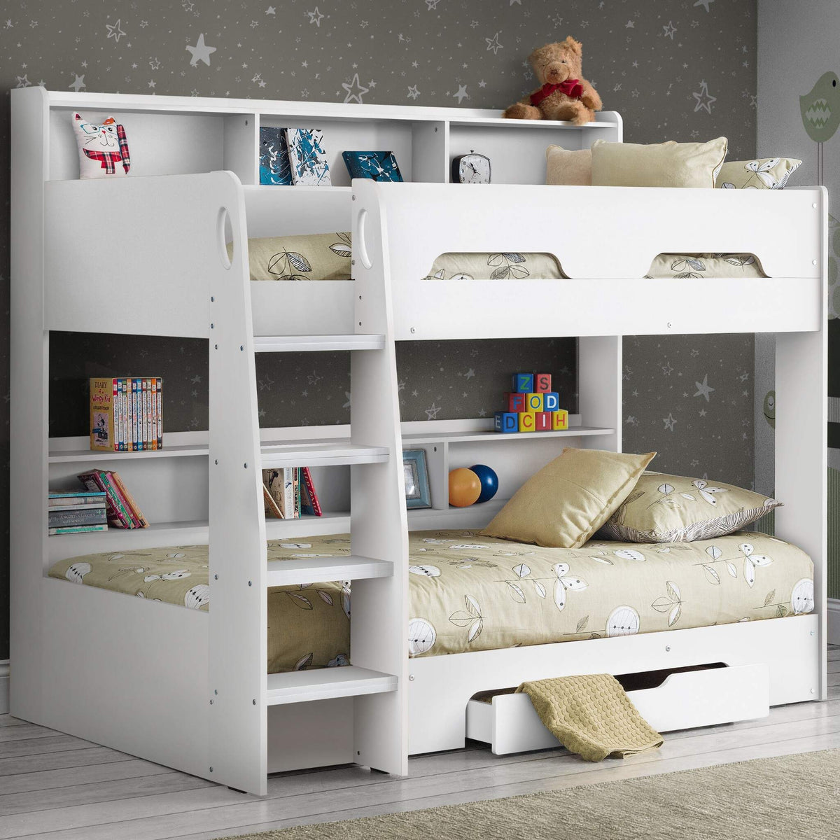 Orion Bunk Bed in white with shelving and storage drawer styled in a child's bedroom