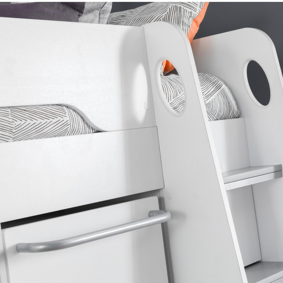 Ladder hand hole and safety rail detail of this children's high sleeper bed in white