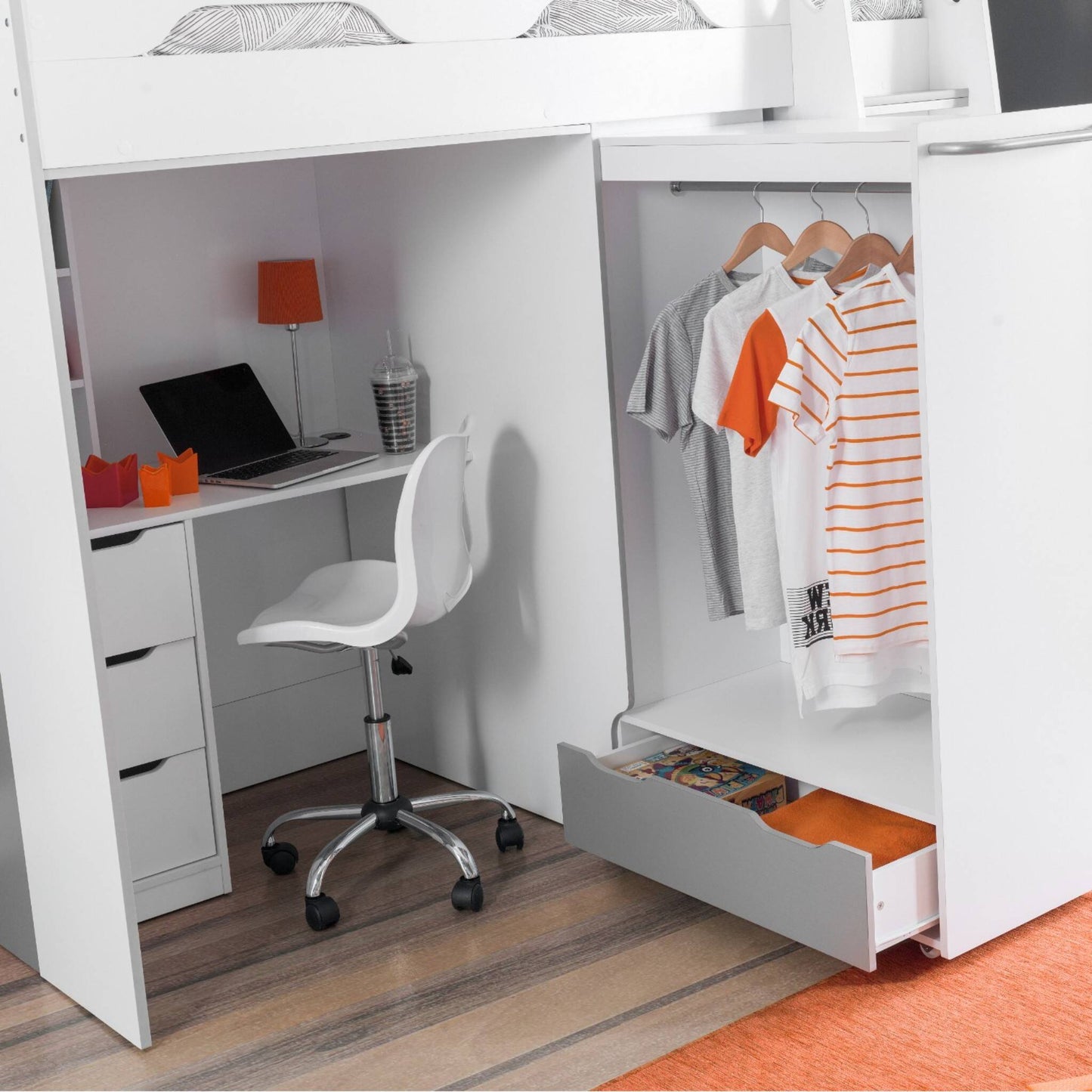 Pull-out wardrobe, desk and storage detail of the Pegasus High Sleeper Bed in white