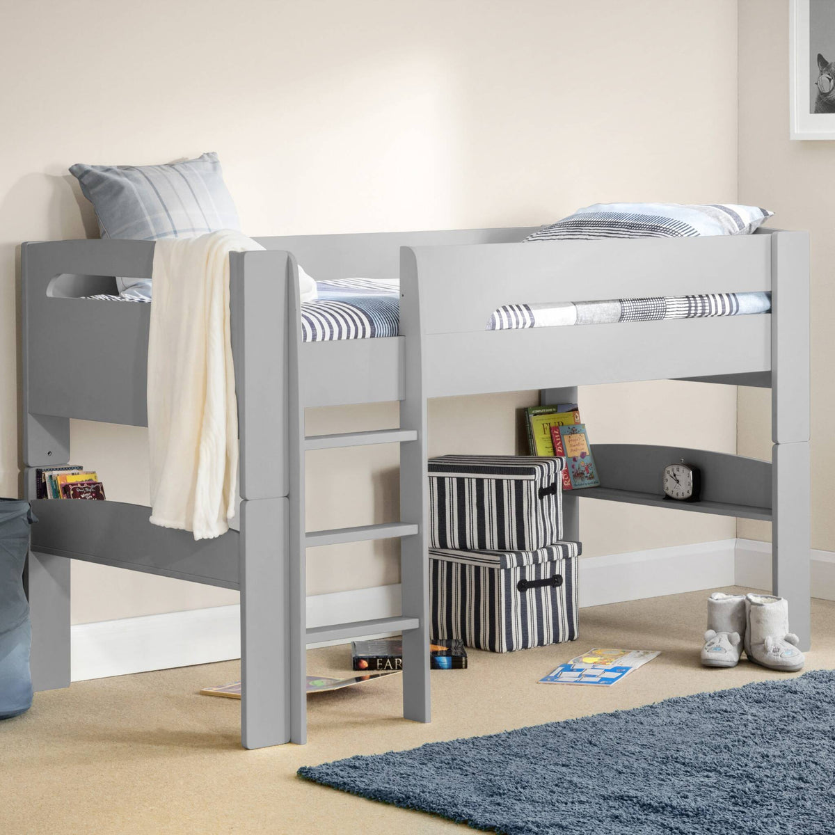 Pluto Mid Sleeper Bed finished in dove grey shown in a bedroom setting