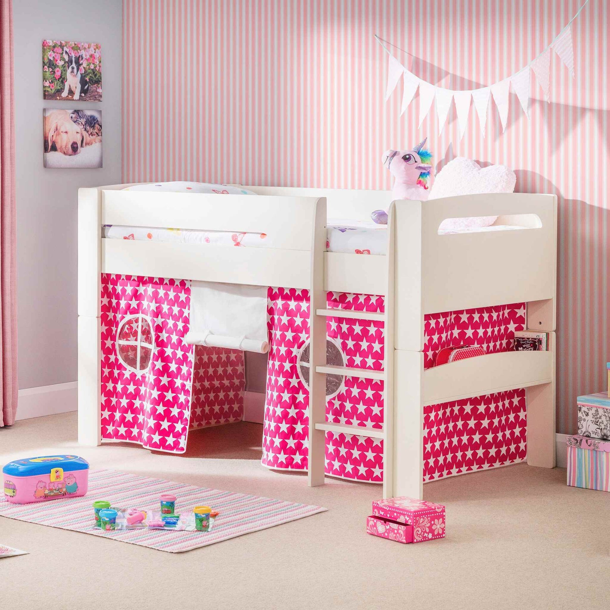 Pluto Mid Sleeper Bed finished in stone white with a Pink Star Tent fitted. Shown in a child's bedroom setting.