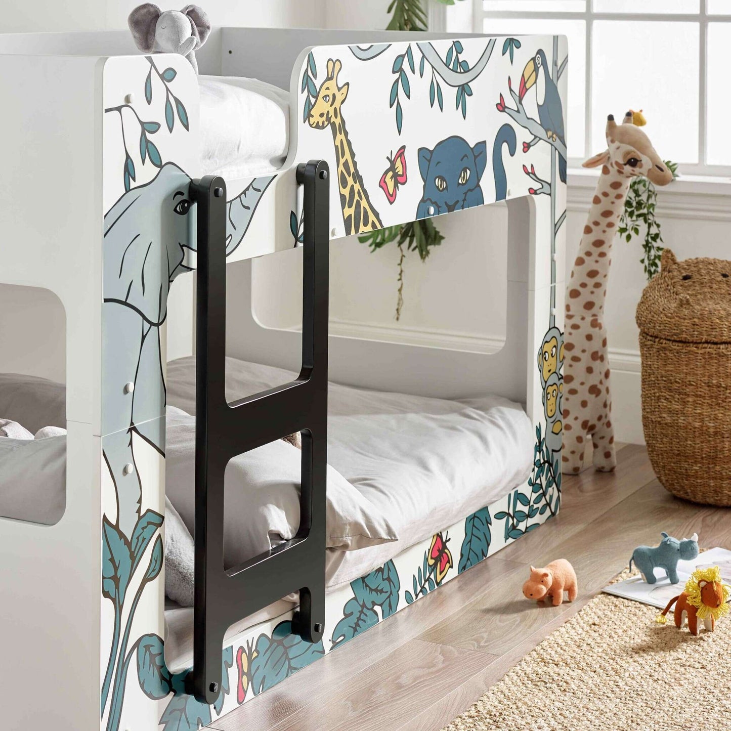 Angled view of this safari themed bunk bed with animal print design