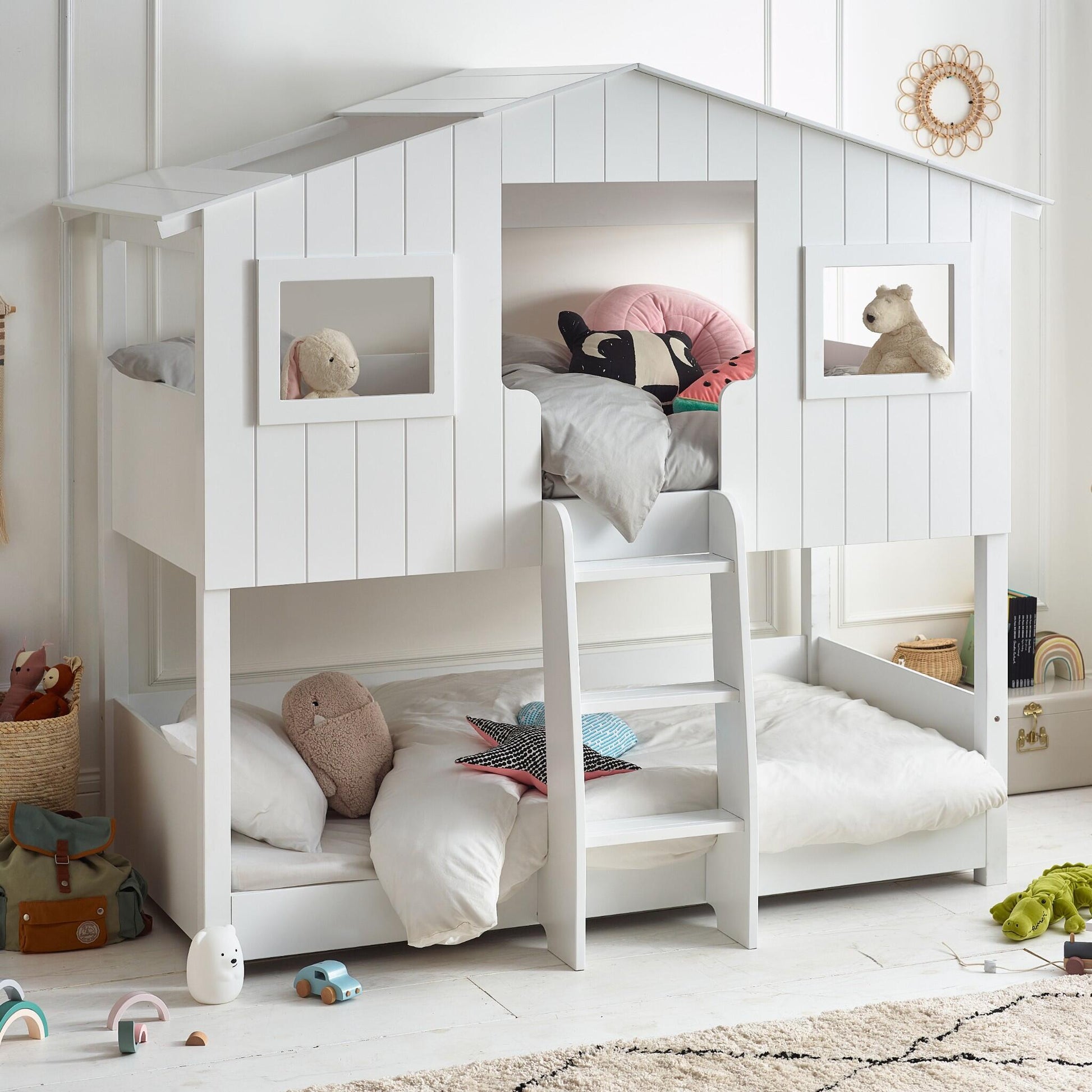 Willow Treehouse Bunk Bed in white, styled in a child's bedroom setting.